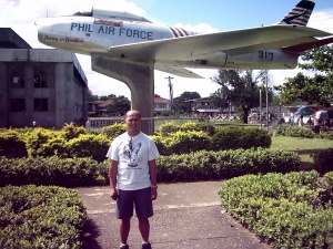 At my back is the plane of the first filipino pilot.JPG